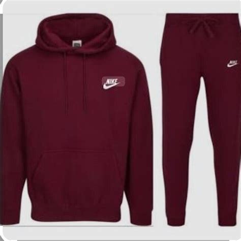 burgundy nike sweatsuit.